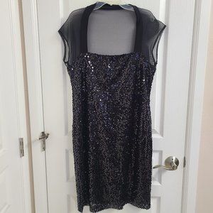 black sequin dress with see-through mesh